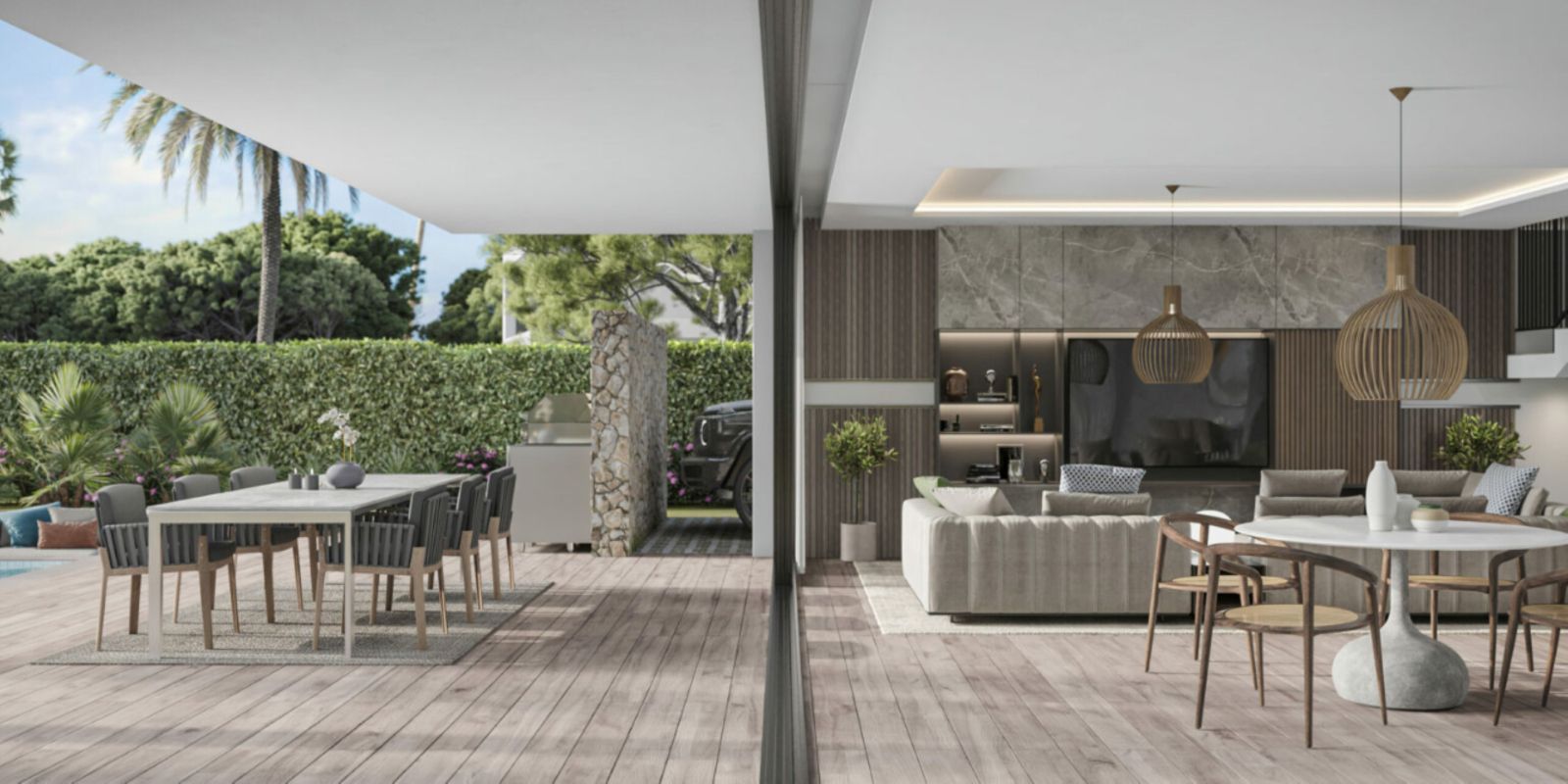 Modern open-plan living room with outdoor patio, large windows, and contemporary furniture.